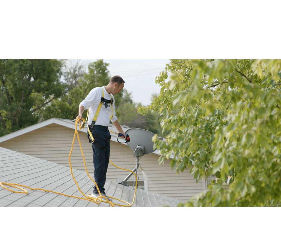 Shingle Maxx technician applying GreenSoy™ on a residential roof
